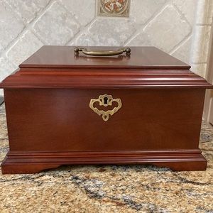 Locking jewelry box with removable stacking tray. Dark brown. Green felt lining